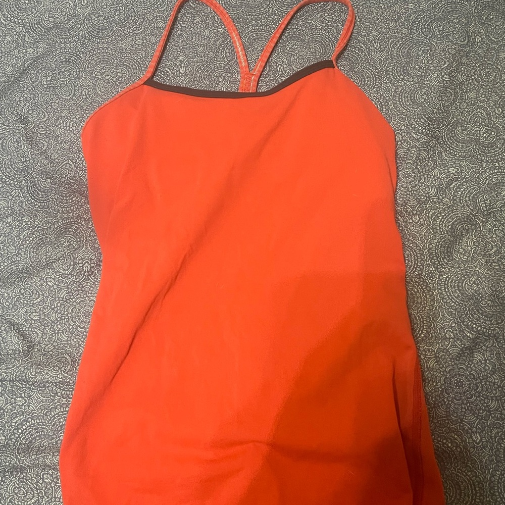 Red LuLuLemon tank top fits like women’s xs-s MAKE OFFERS